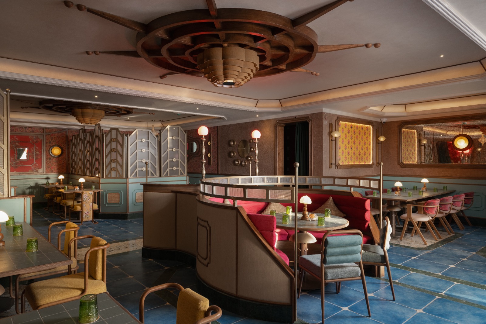 The architectural space at Goonj — curved interiors, warm lighting, and rich textures