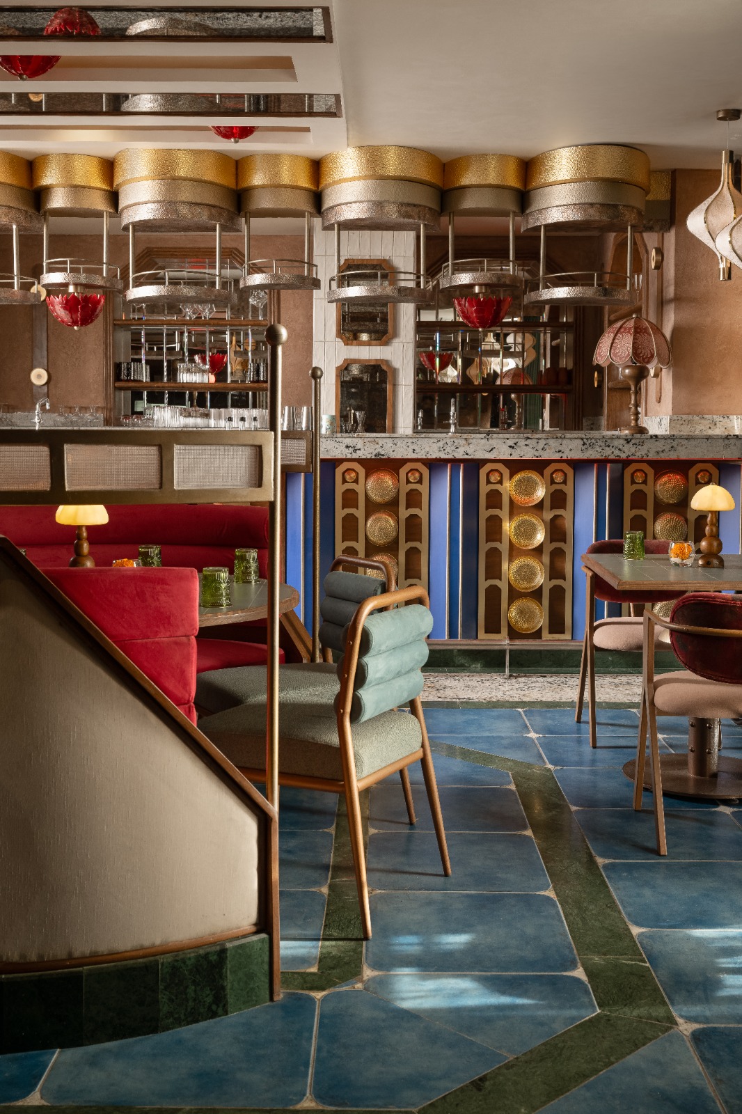 Goonj bar area — brass accents and ambient lighting