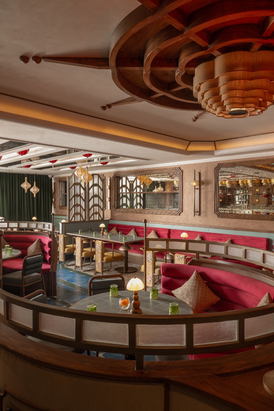 Curved seating booth at Goonj — architectural embrace