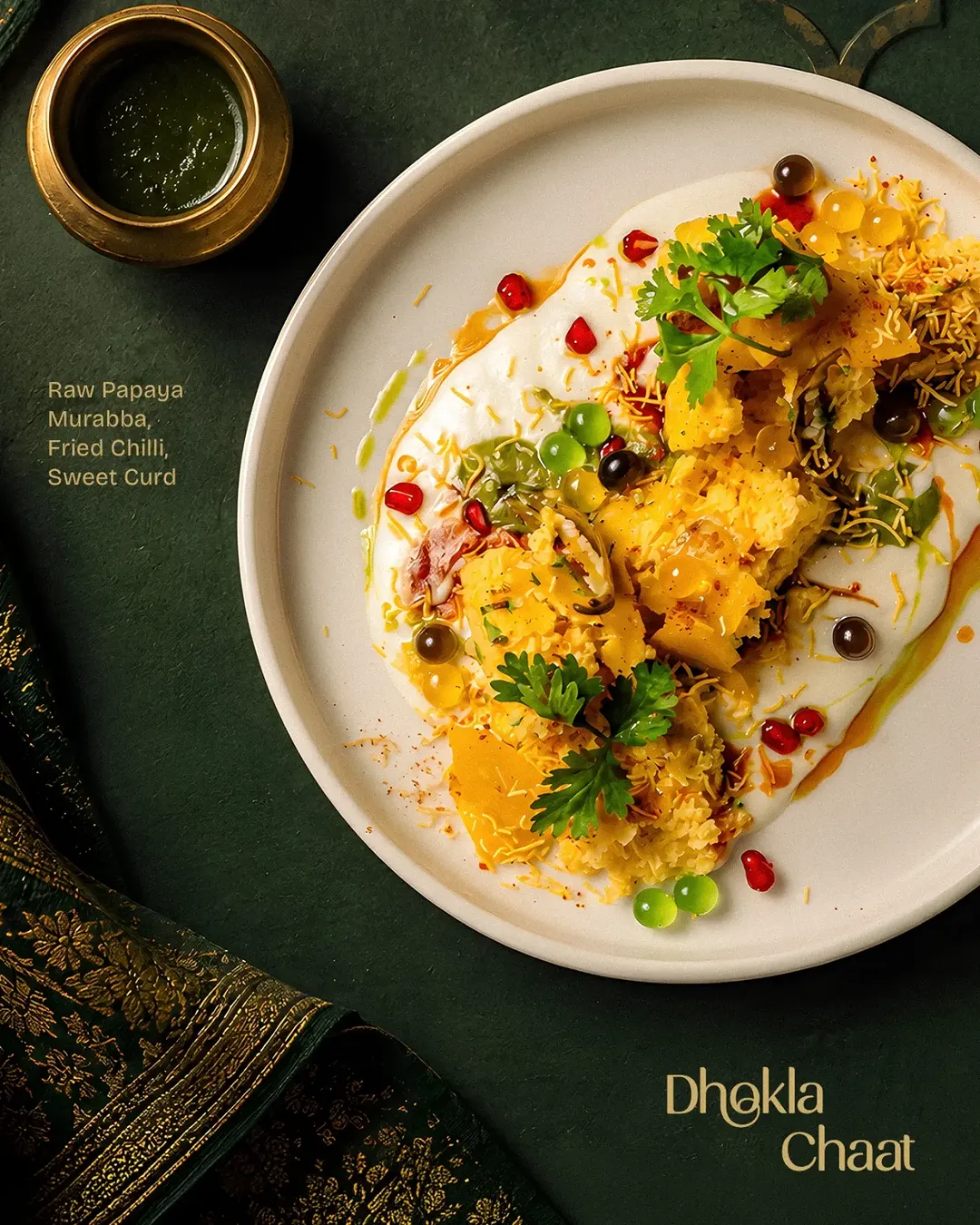 Dhokla Chaat with Raw Papaya Murabba, Fried Chilli, Sweet Curd